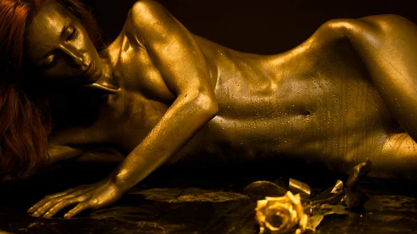 stock image Golden redhead statue