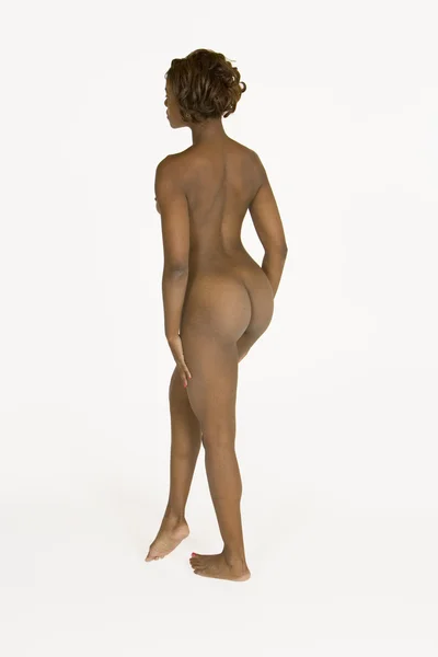 stock image Very sexy and beautiful African American woman posing for a nude figure study isolated on a white background