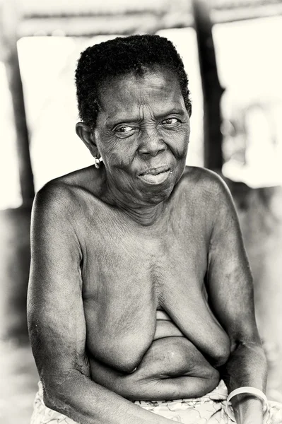 stock image An old half naked lady from Benin